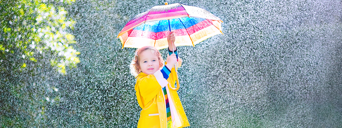 little girl in yellow raincoat